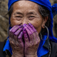 Hmong woman with indigo dye.